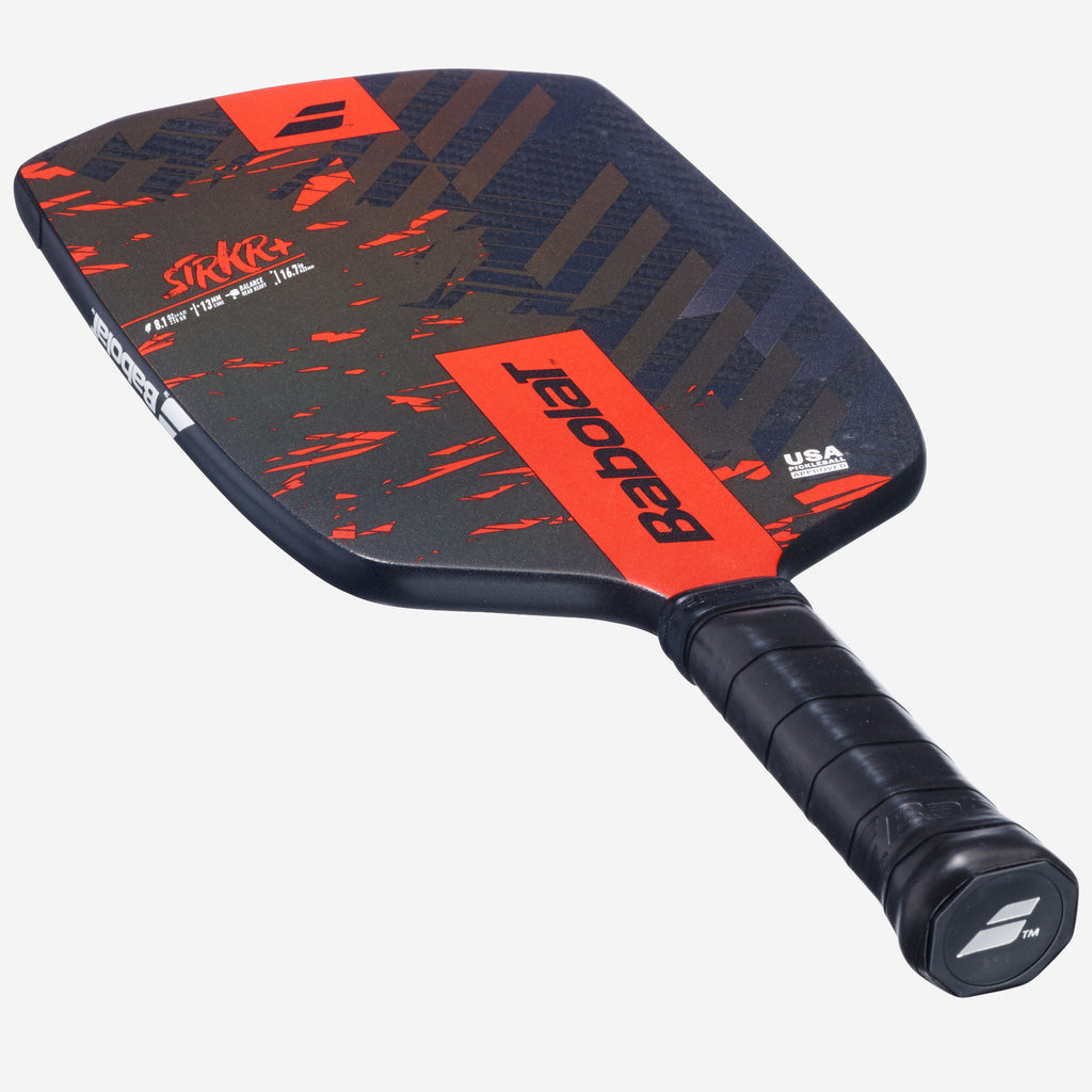 Babolat STRKR+ pickleball paddle — tournament-grade. Textured carbon face, polypropylene core. Power and spin