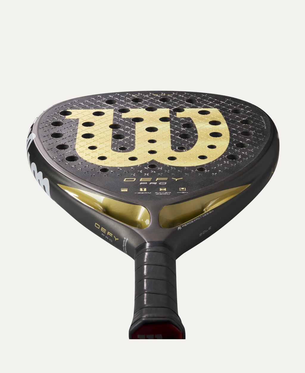 Wilson Defy Pro V1 padel racket — flagship Wilson power. 15K carbon, Power Foam, diamond shape. Advanced attackers