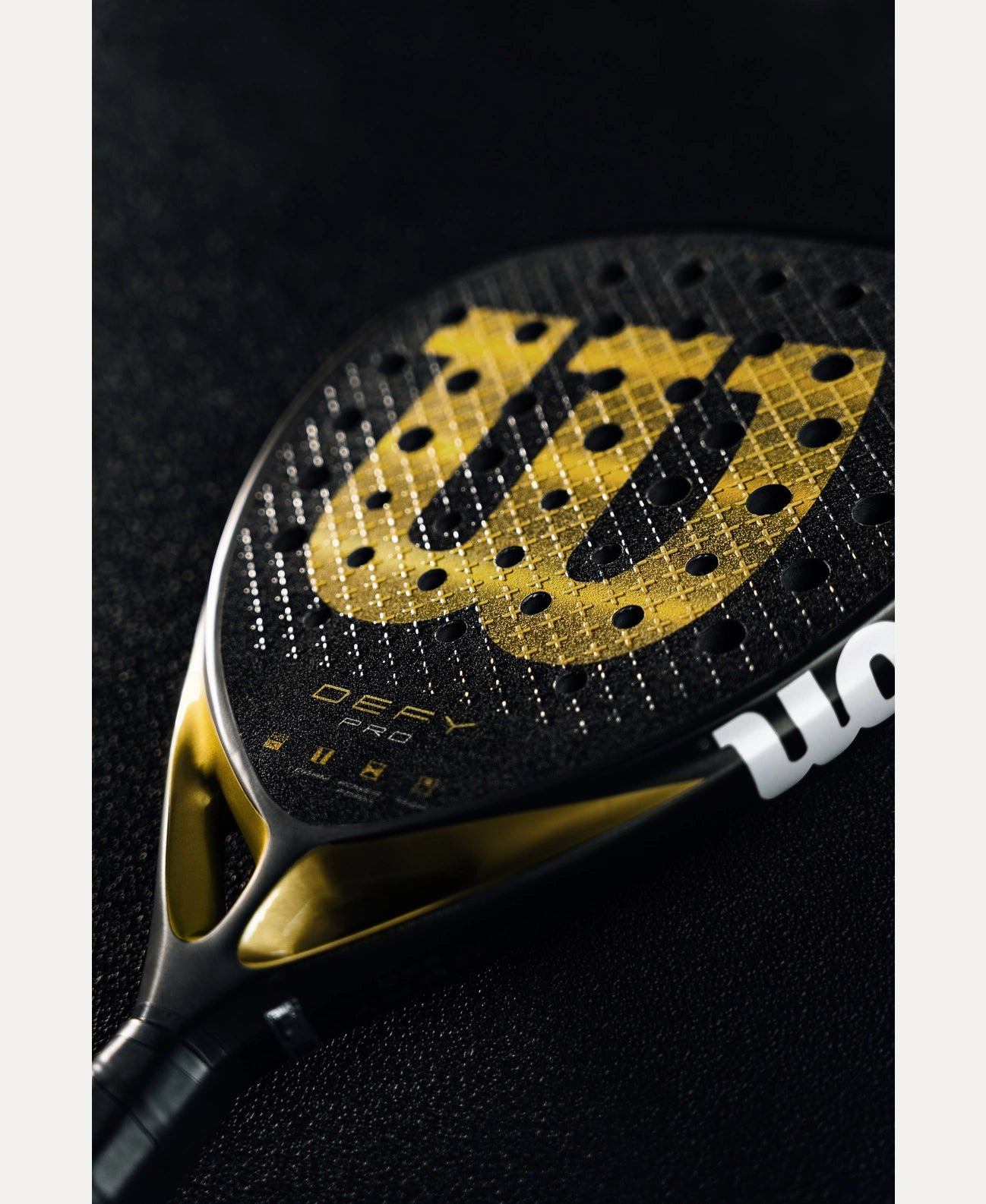 Wilson Defy Pro V1 padel racket — flagship Wilson power. 15K carbon, Power Foam, diamond shape. Advanced attackers