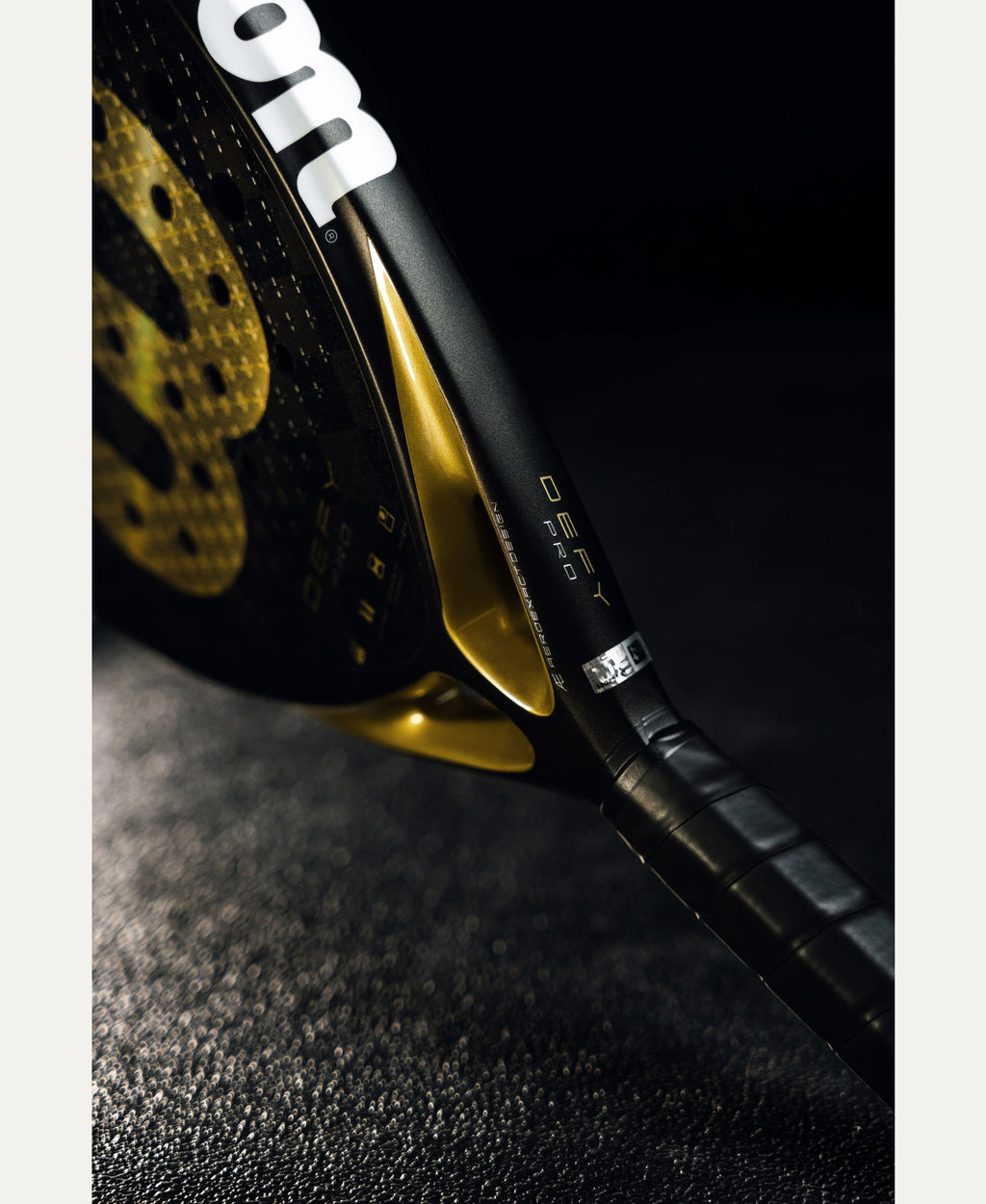 Wilson Defy Pro V1 padel racket — flagship Wilson power. 15K carbon, Power Foam, diamond shape. Advanced attackers