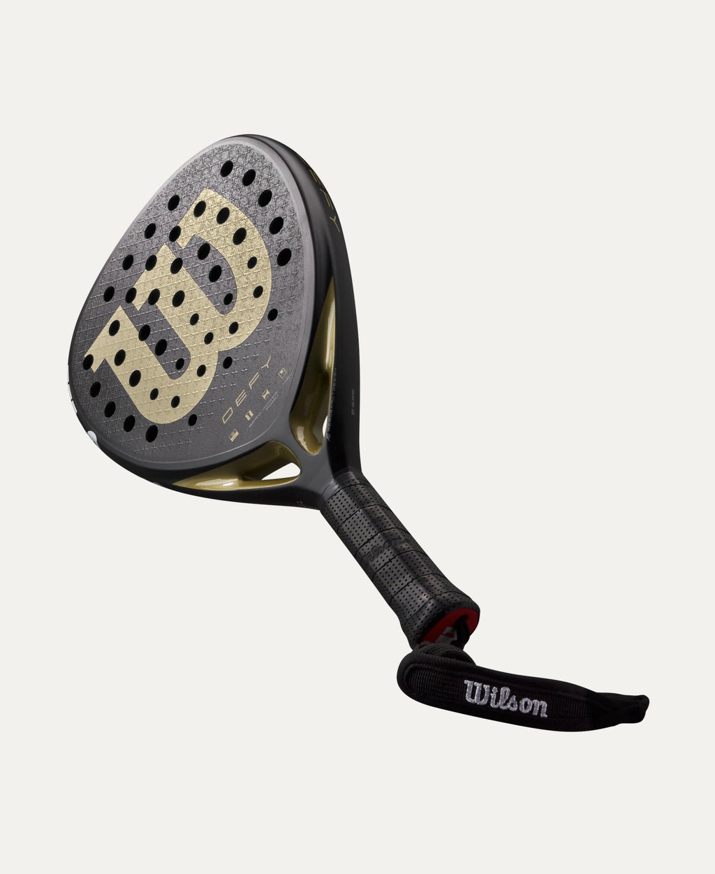 Wilson Defy V1 padel racket — diamond-shape. 3K carbon face, Power Foam core, balanced power. Intermediate to advanced