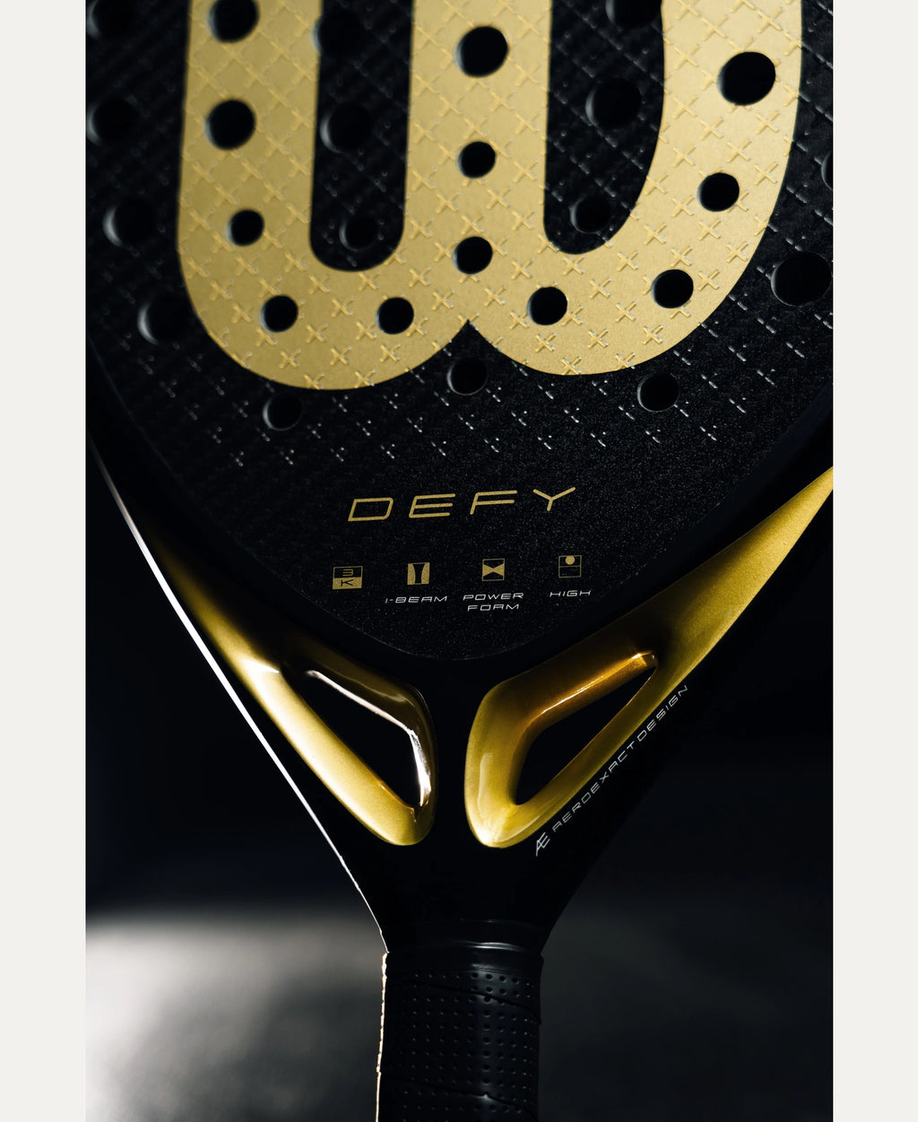 Wilson Defy V1 padel racket — diamond-shape. 3K carbon face, Power Foam core, balanced power. Intermediate to advanced