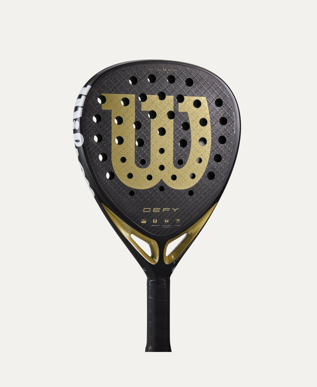Wilson Defy V1 padel racket — diamond-shape. 3K carbon face, Power Foam core, balanced power. Intermediate to advanced